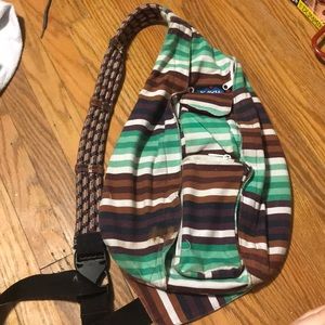 Kavu over cross body bag—- offers welcome